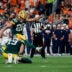 Aug 21, 2026; Denver, Colorado, USA; Green Bay Packers place kicker Trey Smack (28) kicks a point after on a hold from punter Daniel Whelan (19) in the second quarter against the Denver Broncos at Empower Field at Mile High.