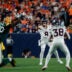 Aug 21, 2026; Denver, Colorado, USA; Denver Broncos quarterback Jarrett Stidham (8) passes to running back Jaleel McLaughlin (38) as Green Bay Packers defensive tackle Anthony Campbell (60) defends in the second quarter at Empower Field at Mile High.