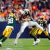 Aug 21, 2026; Denver, Colorado, USA; Denver Broncos tight end Justin Joly (80) pulls in front Green Bay Packers safety Trey Dean (38) in the second half during a preseason game at Empower Field at Mile High.