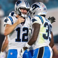 Aug 21, 2026; Jacksonville, Florida, USA; Carolina Panthers quarterback Kenny Pickett (12) congratulates wide receiver Roc Taylor (39) after a touchdown against the Jacksonville Jaguars in the third quarter during a preseason game at EverBank Stadium.