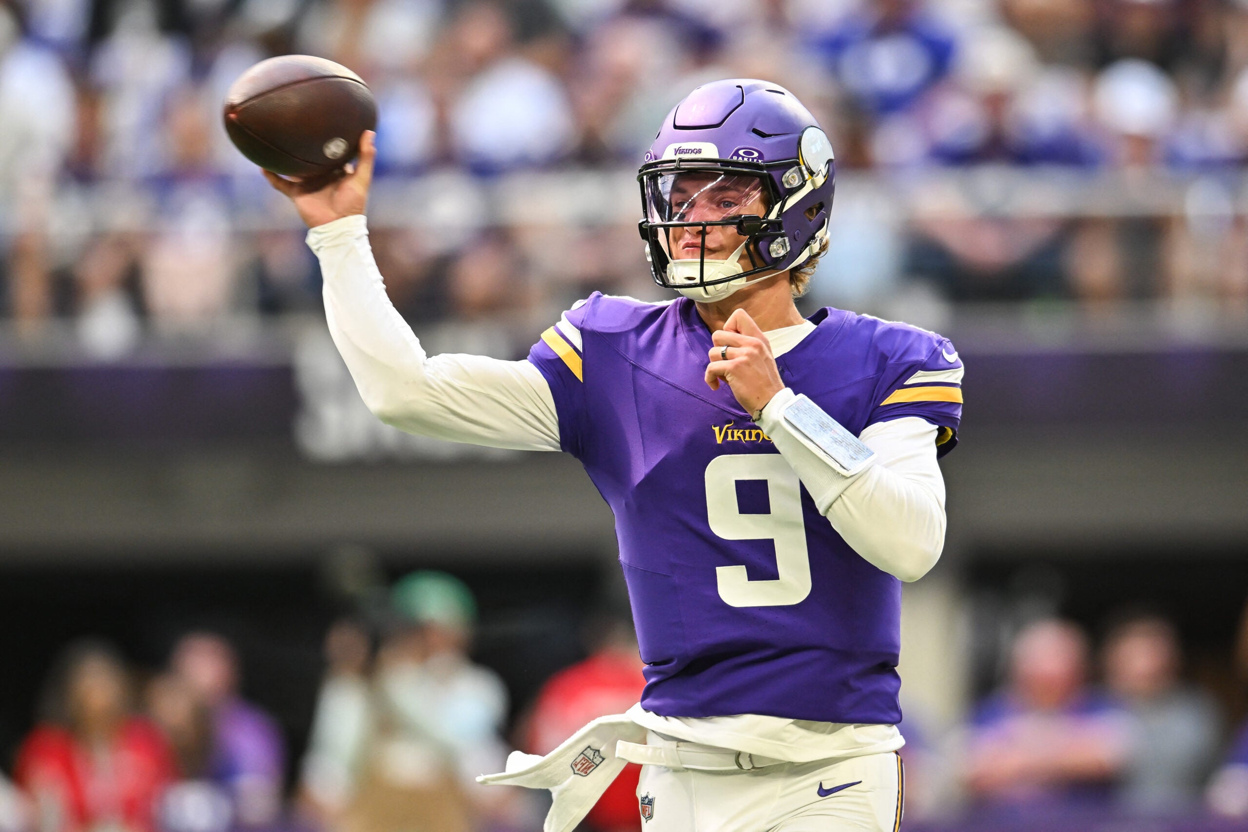 Aug 22, 2026; Minneapolis, Minnesota, USA; Minnesota Vikings quarterback J.J. McCarthy (9) throws a pass against the Baltimore Ravens during the first quarter at U.S. Bank Stadium.