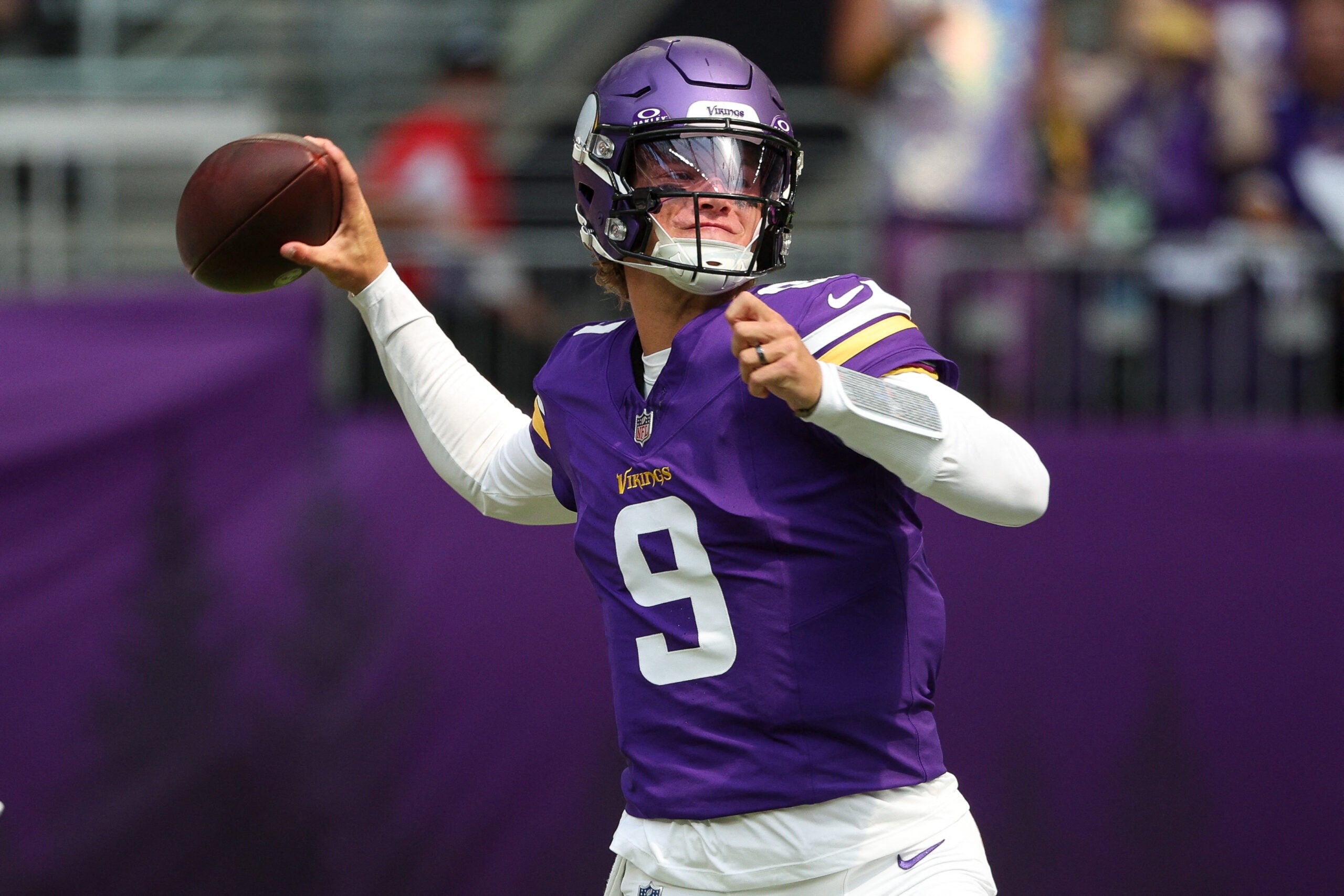 Aug 22, 2026; Minneapolis, Minnesota, USA; Minnesota Vikings quarterback J.J. McCarthy (9) throws the ball against the Baltimore Ravens during the first half at U.S. Bank Stadium.