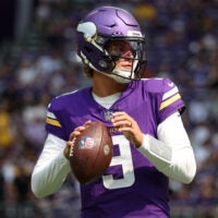 Aug 22, 2026; Minneapolis, Minnesota, USA; Minnesota Vikings quarterback J.J. McCarthy (9) warms up before the game against the Baltimore Ravens at U.S. Bank Stadium.