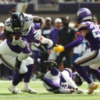 Aug 22, 2026; Minneapolis, Minnesota, USA; Minnesota Vikings defensive tackle Taki Taimani (94) tackles Baltimore Ravens running back Jonathan Ward (35) during the second half at U.S. Bank Stadium.