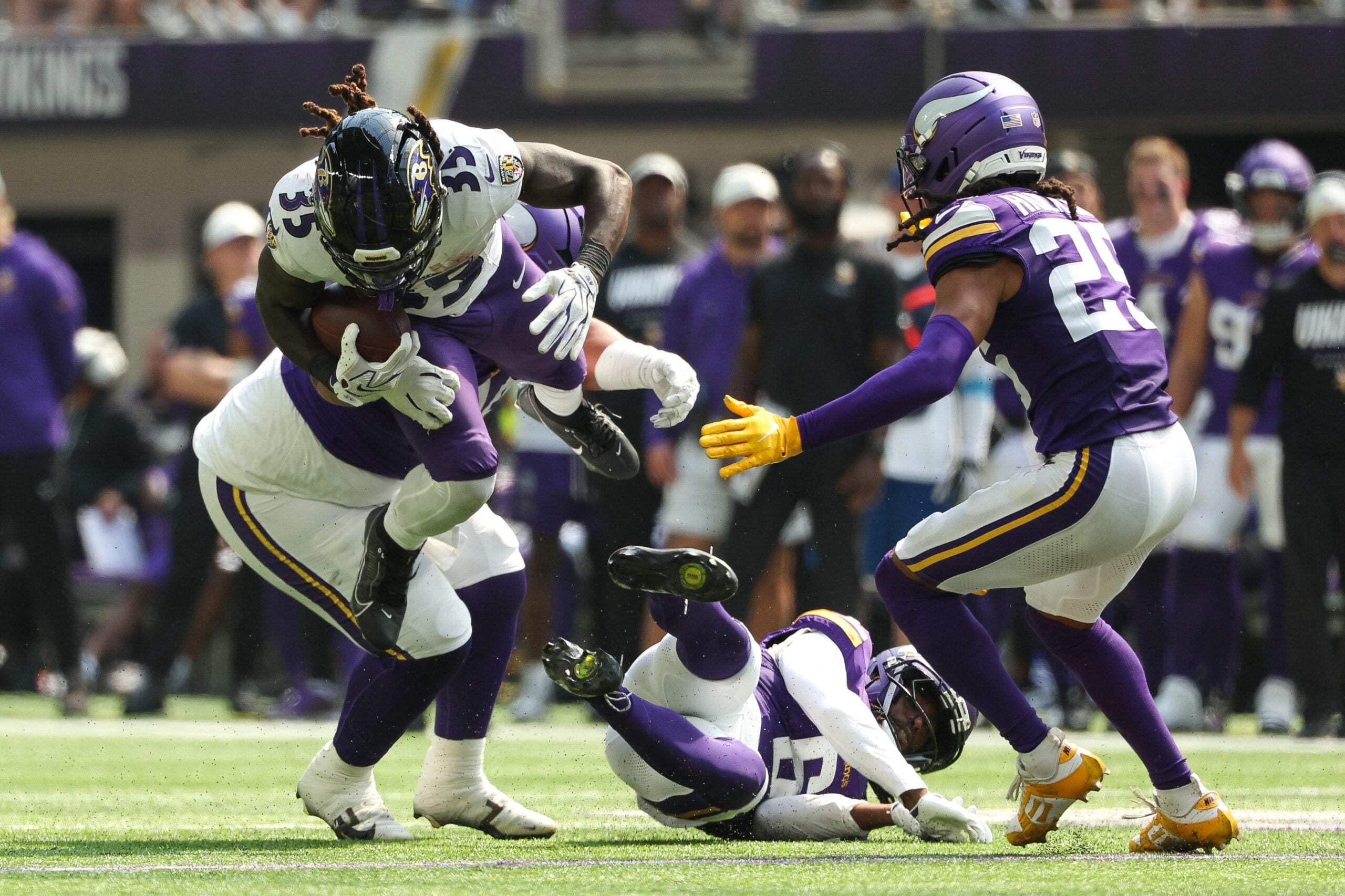 Aug 22, 2026; Minneapolis, Minnesota, USA; Minnesota Vikings defensive tackle Taki Taimani (94) tackles Baltimore Ravens running back Jonathan Ward (35) during the second half at U.S. Bank Stadium.