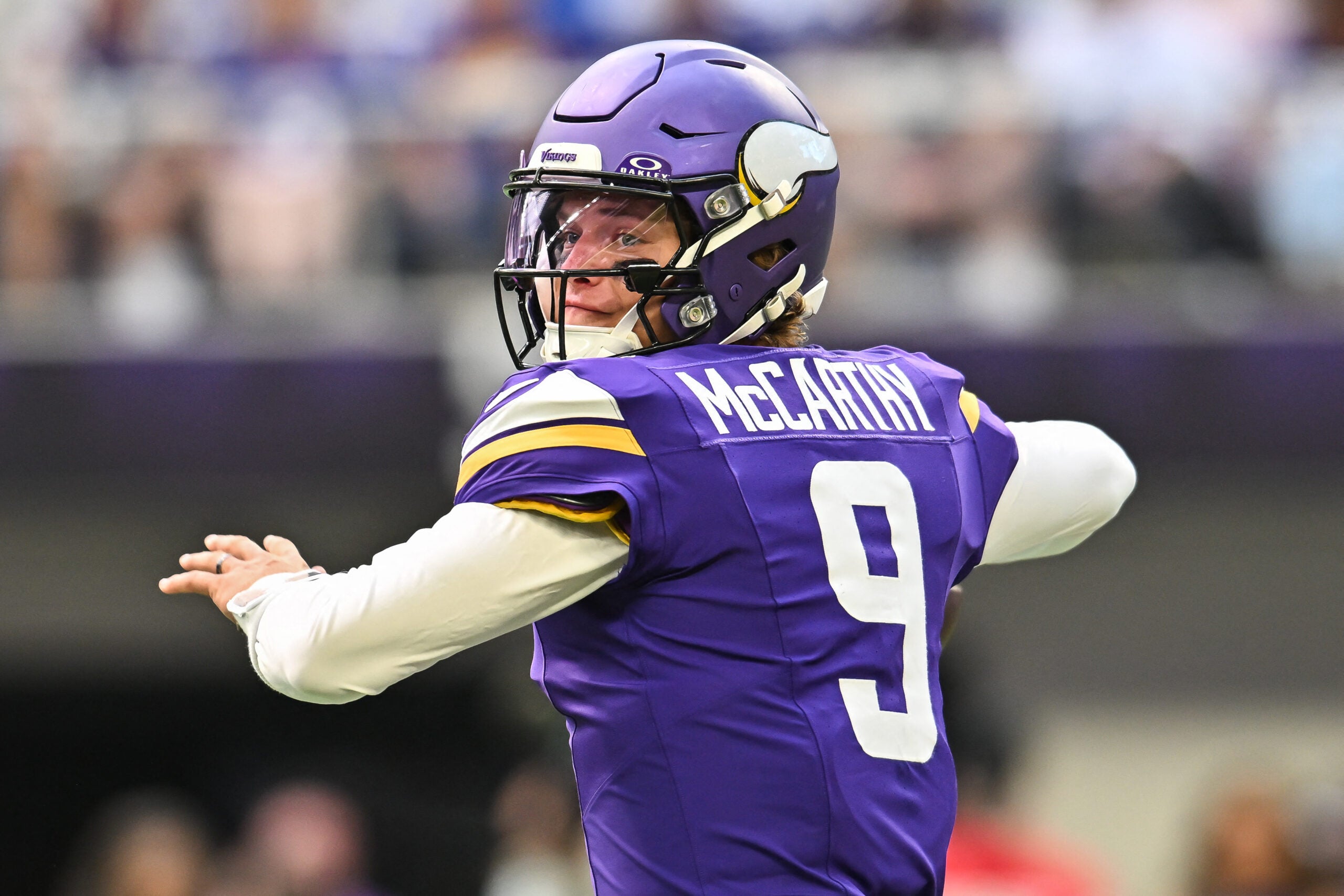 Aug 22, 2026; Minneapolis, Minnesota, USA; Minnesota Vikings quarterback J.J. McCarthy (9) looks to throw a pass against the Baltimore Ravens during the first quarter at U.S. Bank Stadium.