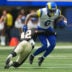 Aug 22, 2026; Inglewood, California, USA; Los Angeles Rams wide receiver CJ Daniels (6) carries the ball against 42 in the first half at SoFi Stadium.