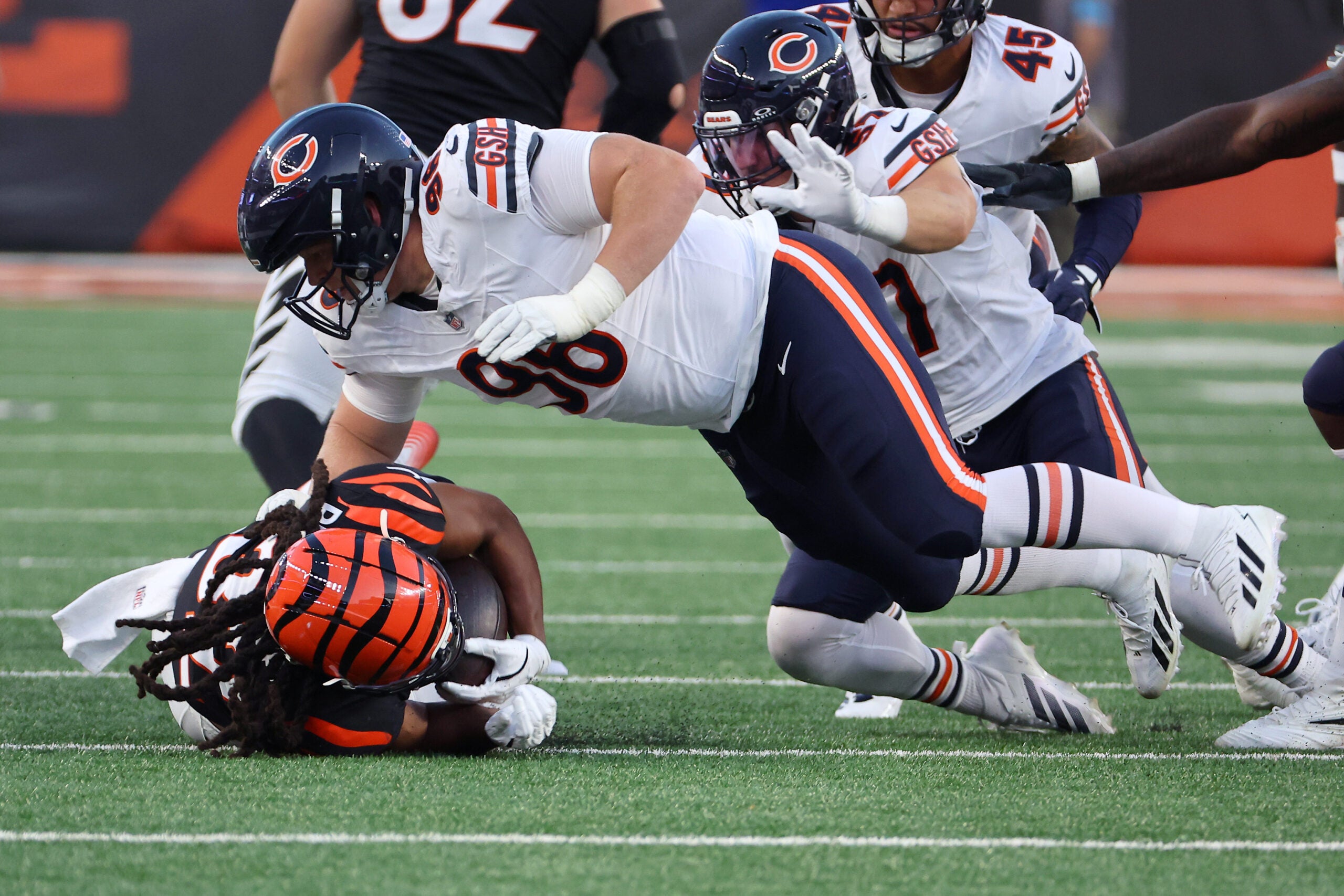 Aug 22, 2026; Cincinnati, Ohio, USA; Chicago Bears defensive tackle Jordan van den Berg (96) makes a tackle against Cincinnati Bengals running back Kentrel Bullock (31) during the second quarter at Paycor Stadium.