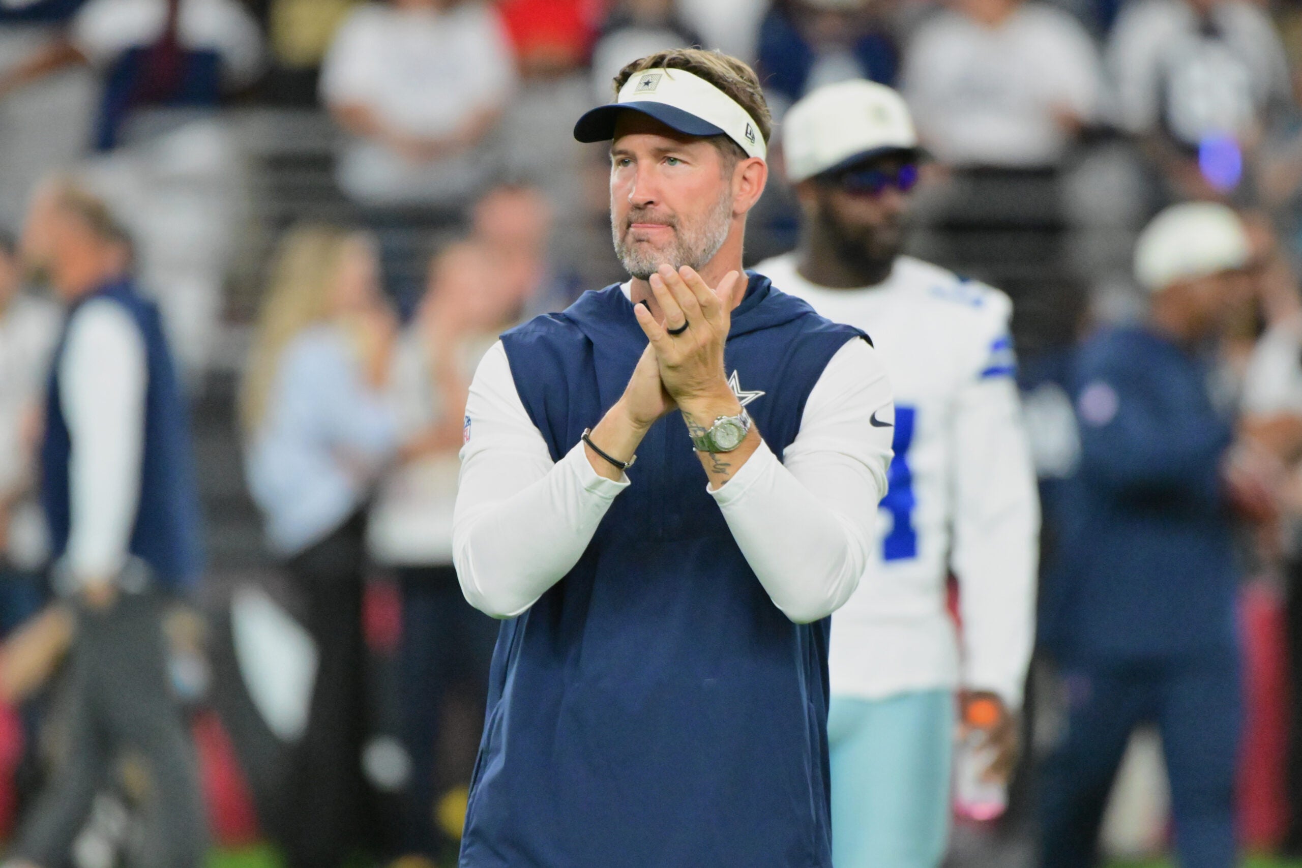 Aug 22, 2026; Glendale, Arizona, USA; Dallas Cowboys head coach Brian Schottenheimer looks on prior to the game against the Arizona Cardinals at State Farm Stadium.