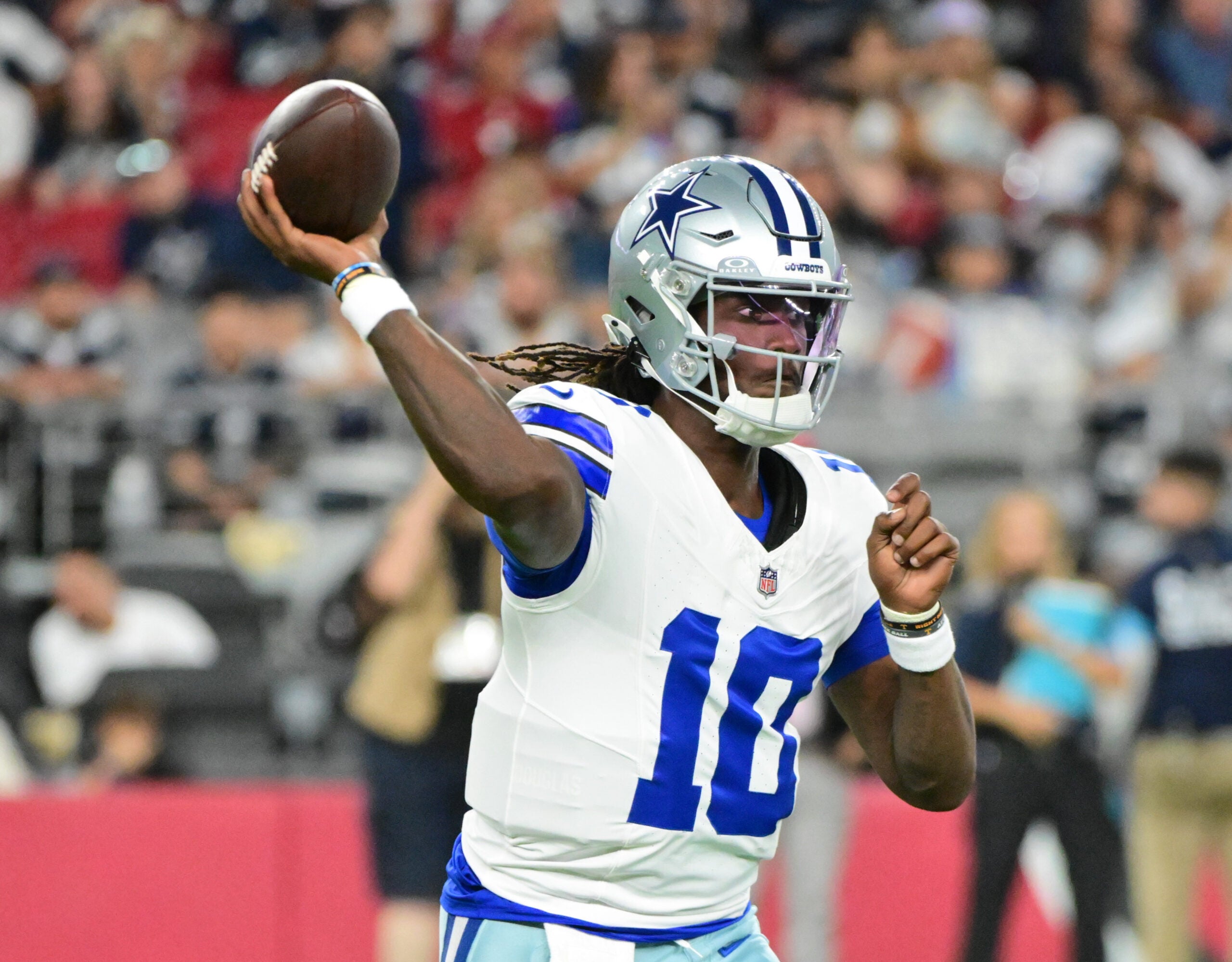 Aug 22, 2026; Glendale, Arizona, USA; Dallas Cowboys quarterback Joe Milton III (10) throws a pass in the first half against the Arizona Cardinals at State Farm Stadium.
