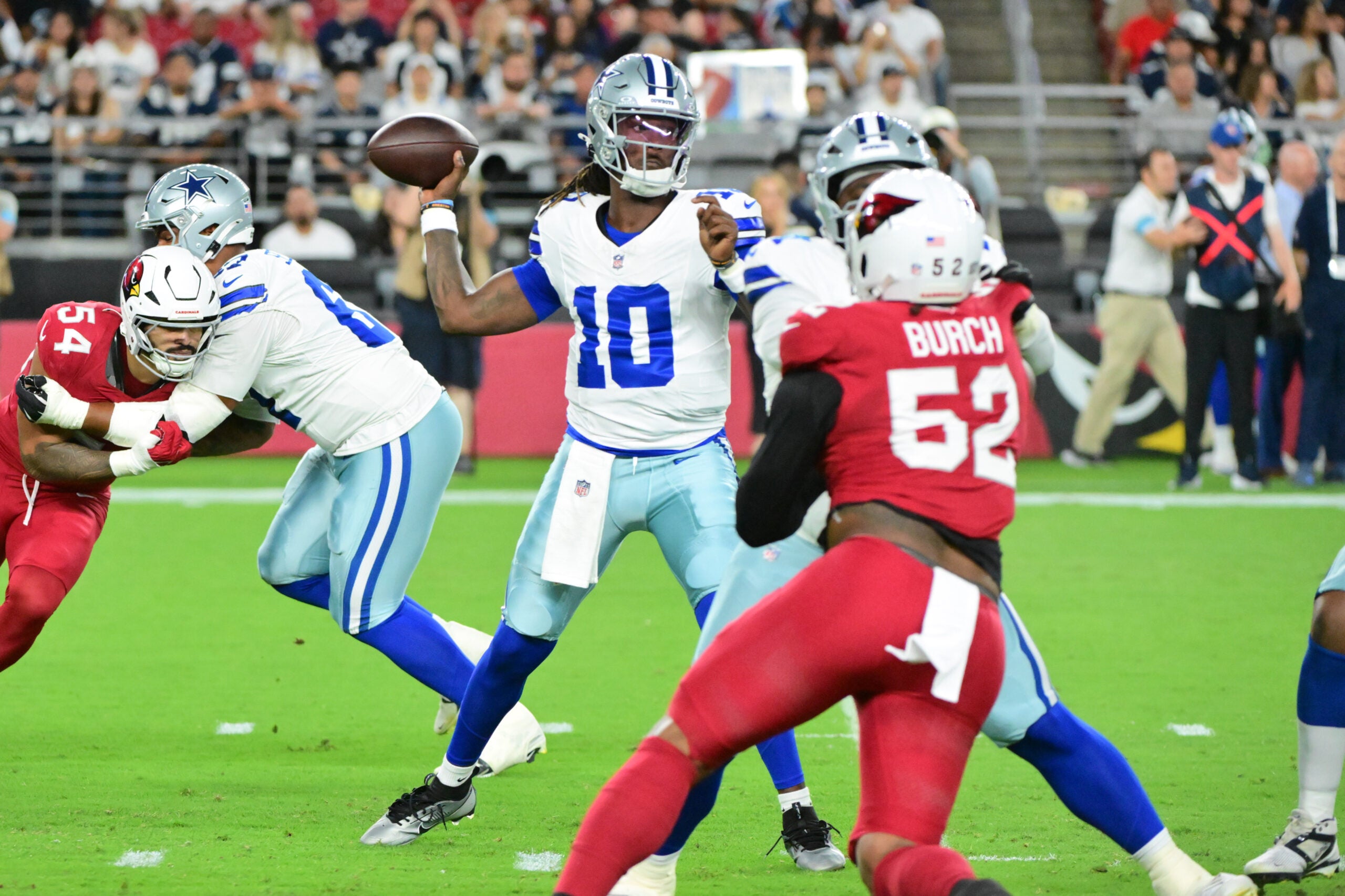 Aug 22, 2026; Glendale, Arizona, USA; Dallas Cowboys quarterback Joe Milton III (10) prepares to throw a pass in the first half against the Arizona Cardinals at State Farm Stadium.