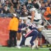 Aug 22, 2026; Foxborough, Massachusetts, USA; Philadelphia Eagles running back Carson Steele (34) leaps over New England Patriots safety Eric Butler (30) and scores a touchdown during the second half at Gillette Stadium.