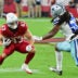 Aug 22, 2026; Glendale, Arizona, USA; Arizona Cardinals running back Evan Hull (43) runs the ball against Dallas Cowboys linebacker Jaishawn Barham (55) in the first half at State Farm Stadium.