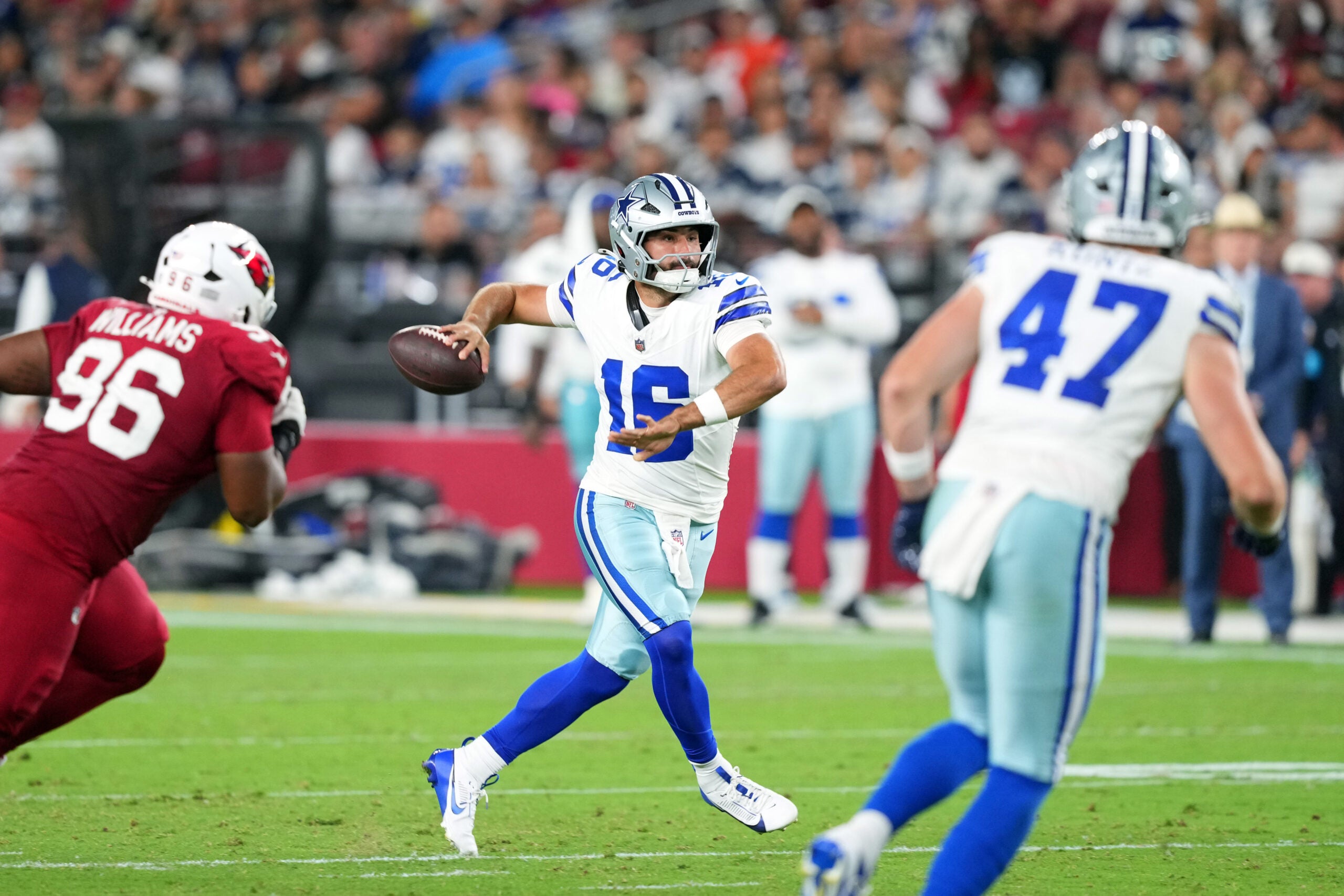 Aug 22, 2026; Glendale, Arizona, USA; Dallas Cowboys quarterback Sam Howell (16) passes against the Arizona Cardinals during the second half at State Farm Stadium.