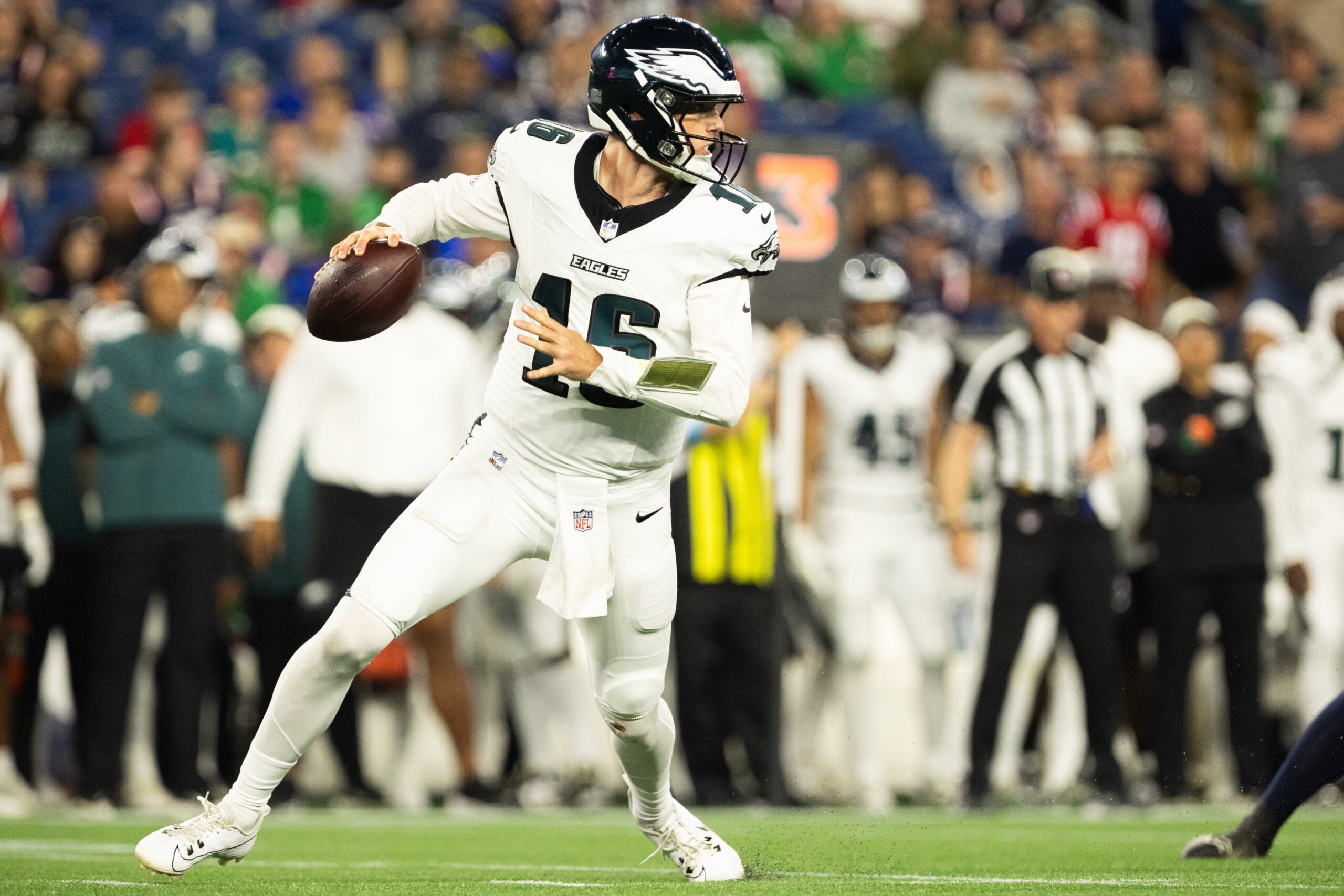 Aug 22, 2026; Foxborough, Massachusetts, USA; Philadelphia Eagles quarterback Tanner McKee (16) scrambles in the second half against the New England Patriots at Gillette Stadium.