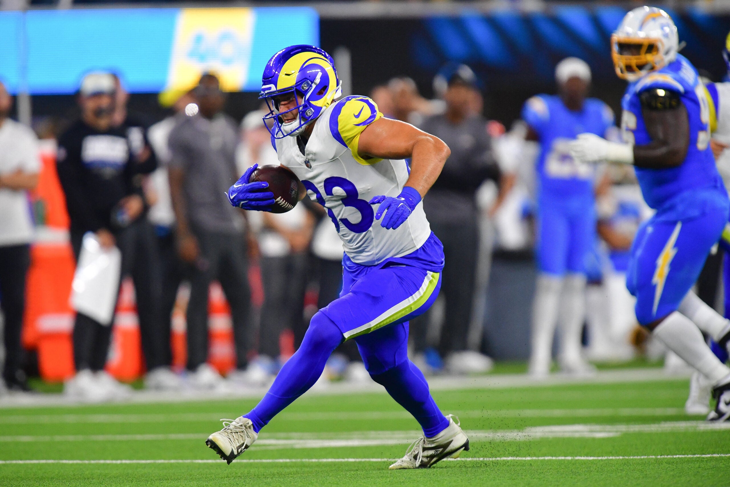 Aug 27, 2026; Inglewood, California, USA; Los Angeles Rams tight end Mark Redman (83) runs the ball against the Los Angeles Chargers during the first half at SoFi Stadium.