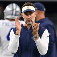 Aug 28, 2026; Arlington, Texas, USA; Dallas Cowboys head coach Brian Schottenheimer looks on during warm ups before the game against the New Orleans Saints at AT&T Stadium.