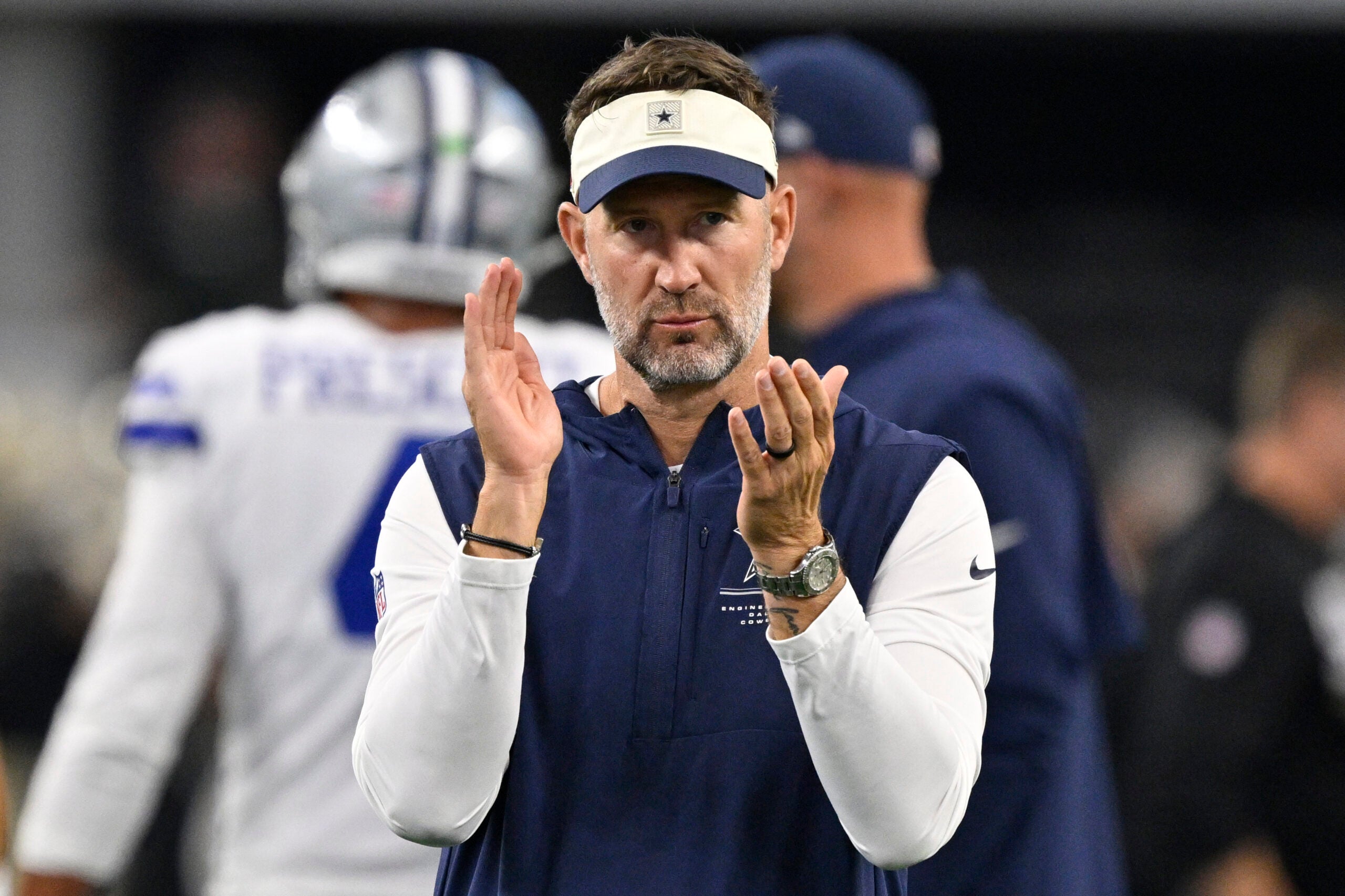 Aug 28, 2026; Arlington, Texas, USA; Dallas Cowboys head coach Brian Schottenheimer looks on during warm ups before the game against the New Orleans Saints at AT&T Stadium.
