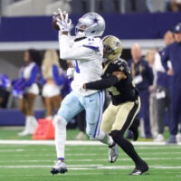 Aug 28, 2026; Arlington, Texas, USA; Dallas Cowboys wide receiver Marquez Valdes-Scantling (11) makes a catch against New Orleans Saints cornerback TJ Hall (34) during the first half at AT&T Stadium.