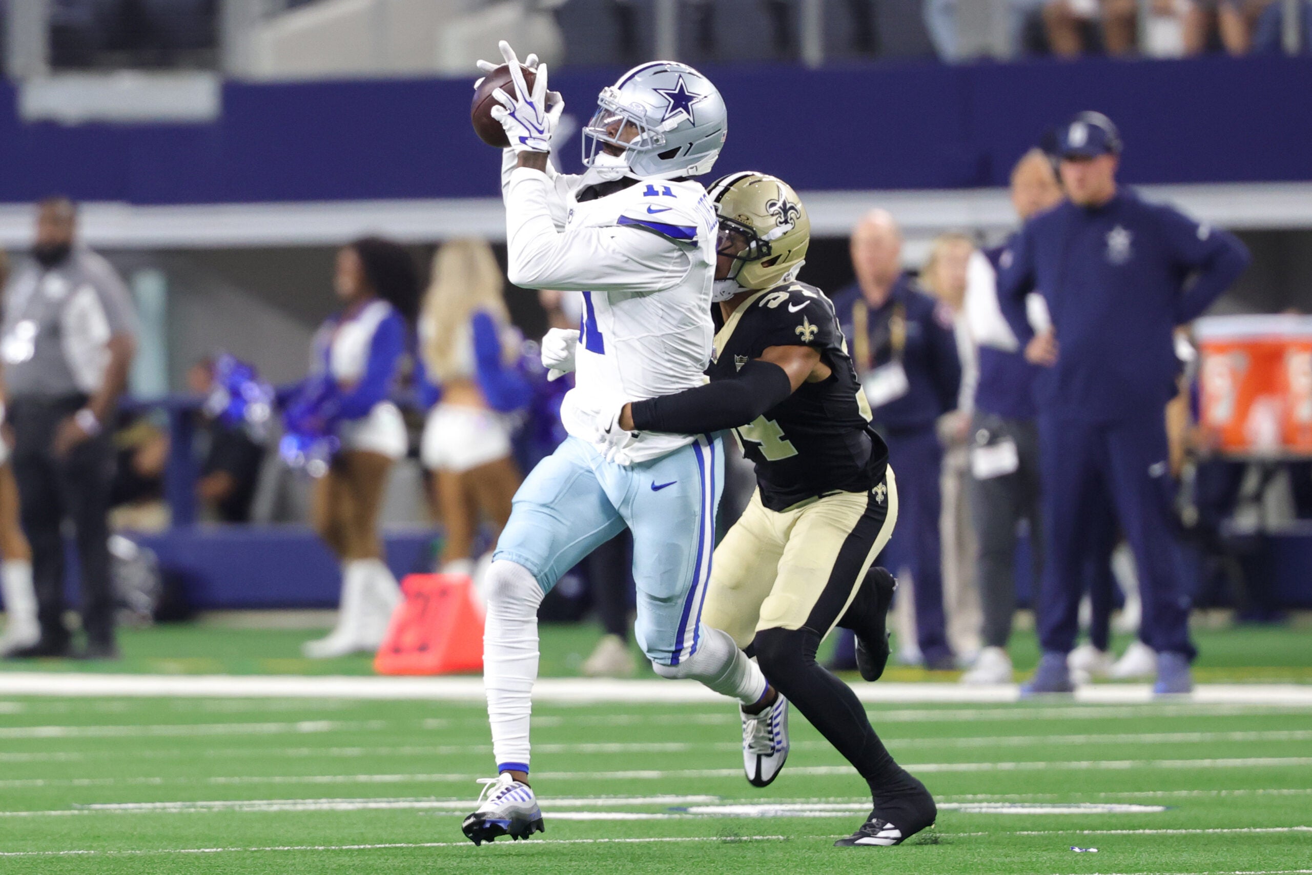 Aug 28, 2026; Arlington, Texas, USA; Dallas Cowboys wide receiver Marquez Valdes-Scantling (11) makes a catch against New Orleans Saints cornerback TJ Hall (34) during the first half at AT&T Stadium.