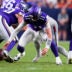 Aug 28, 2026; Denver, Colorado, USA; Minnesota Vikings quarterback Carson Wentz (11) fumbles the ball in the first quarter against the Denver Broncos during a preseason game at Empower Field at Mile High.
