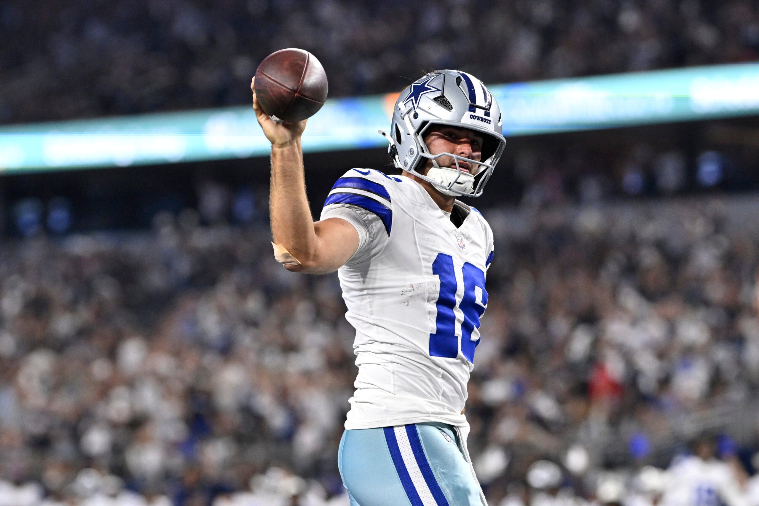 Aug 28, 2026; Arlington, Texas, USA; Dallas Cowboys quarterback Sam Howell (16) celebrates after running for a two-point conversion against the New Orleans Saints during the fourth quarter at AT&T Stadium.