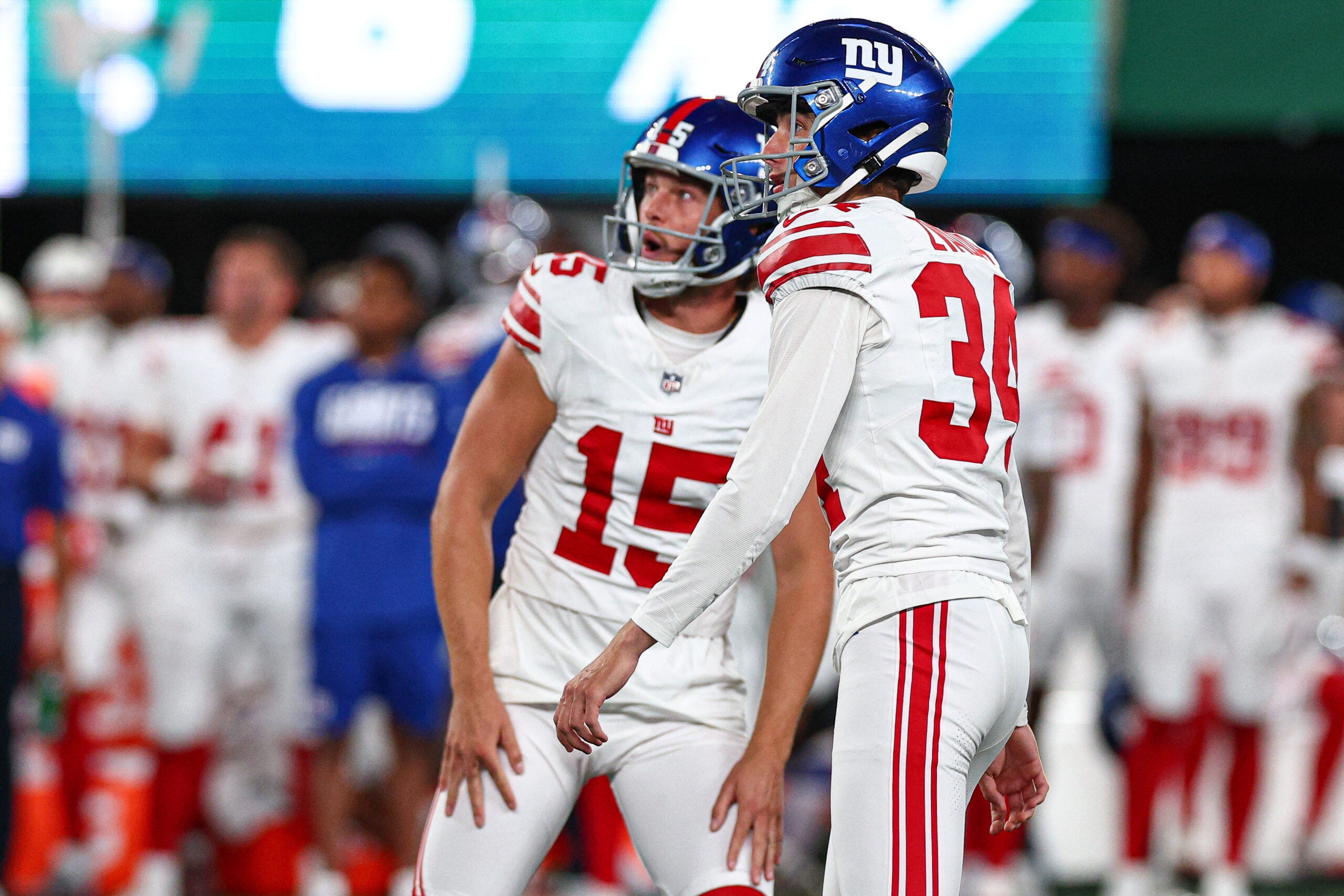Aug 28, 2026; East Rutherford, New Jersey, USA; New York Giants place kicker Dominic Zvada (34) look up after kicking a field goal with punter Jordan Stout (15) during the second half against the New York Jets at MetLife Stadium.