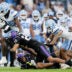 Aug 29, 2026; Dublin, Co. Dublin, IRL; North Carolina Tar Heels tight end Jelani Thurman (45) is tackled by TCU Horned Frogs safety Jordan Lester (22) in the second half at Aviva Stadium.