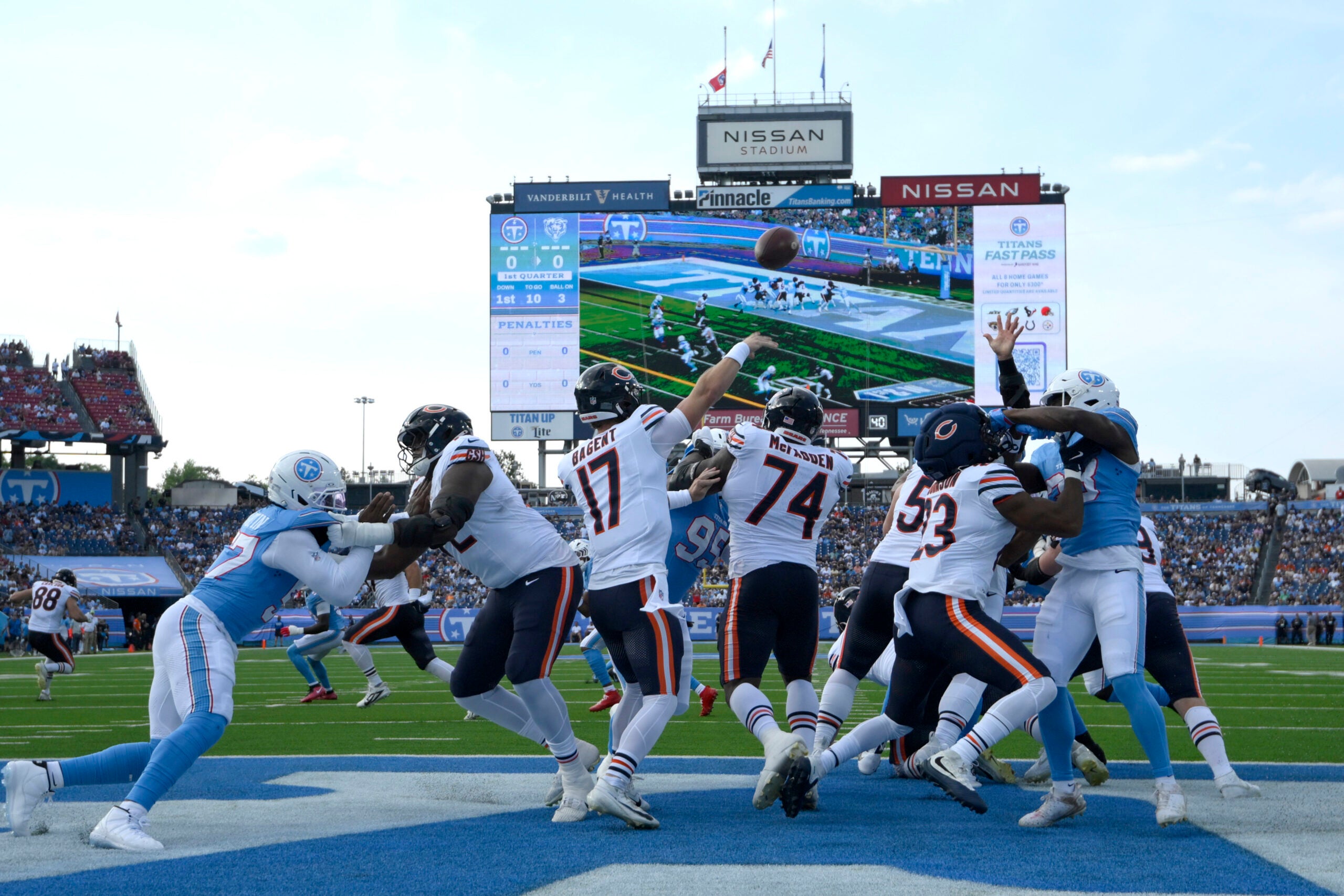 Aug 29, 2026; Nashville, Tennessee, USA; Chicago Bears quarterback Tyson Bagent (17) throws a pass for a touchdown against the Tennessee Titans in the first quarter at Nissan Stadium.
