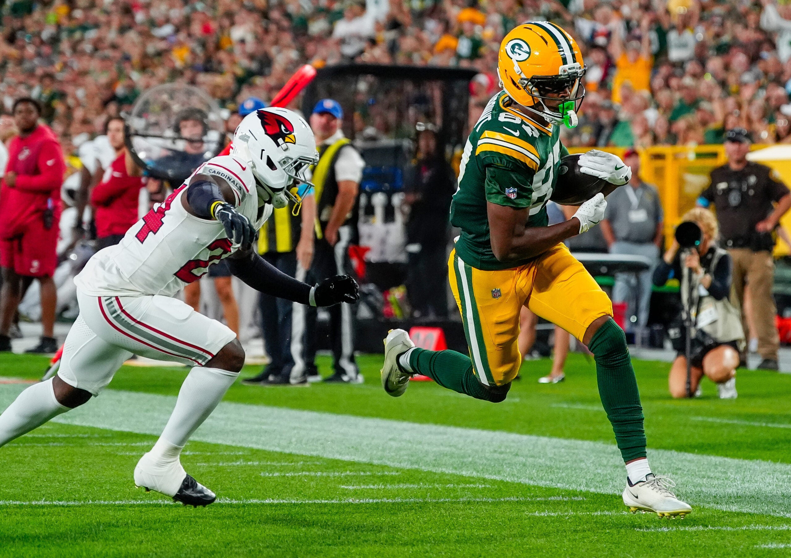 Green Bay Packers wide receiver J. Michael Sturdivant (87) scores a touchdown against the Arizona Cardinals during their preseason football game on Friday, Aug. 28, 2026, at Lambeau Field in Green Bay, Wisconsin.
