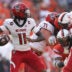 Aug 29, 2026; Charlottesville, Virginia, USA; North Carolina State Wolfpack quarterback CJ Bailey (11) passes the ball during the game against the Virginia Cavaliers at Scott Stadium.