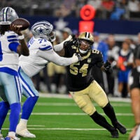 Aug 28, 2026; Arlington, Texas, USA; Dallas Cowboys offensive tackle Nate Thomas (71) blocks New Orleans Saints linebacker Anfernee Jennings (54) during the game between the Cowboys and the Saints at AT&T Stadium.