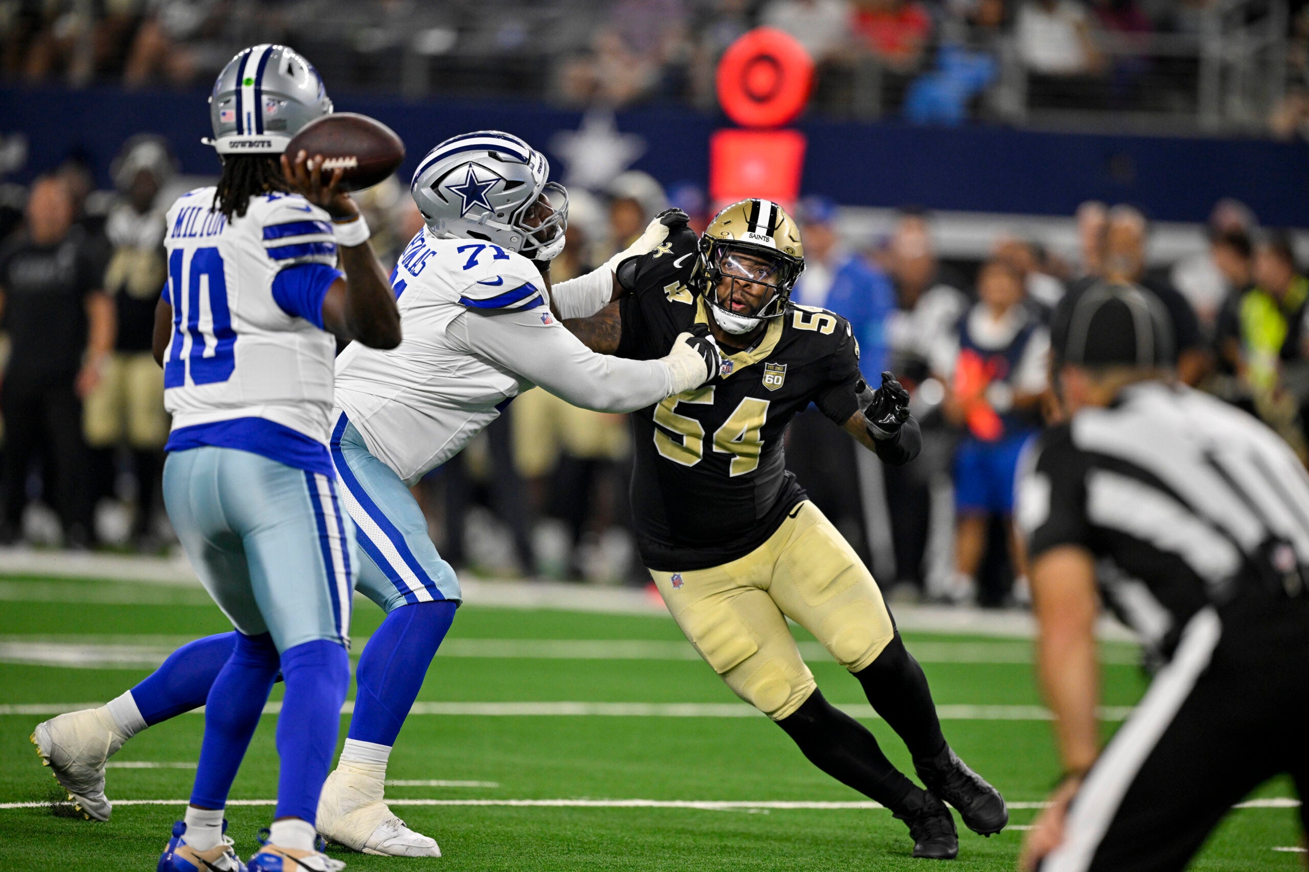 Aug 28, 2026; Arlington, Texas, USA; Dallas Cowboys offensive tackle Nate Thomas (71) blocks New Orleans Saints linebacker Anfernee Jennings (54) during the game between the Cowboys and the Saints at AT&T Stadium.