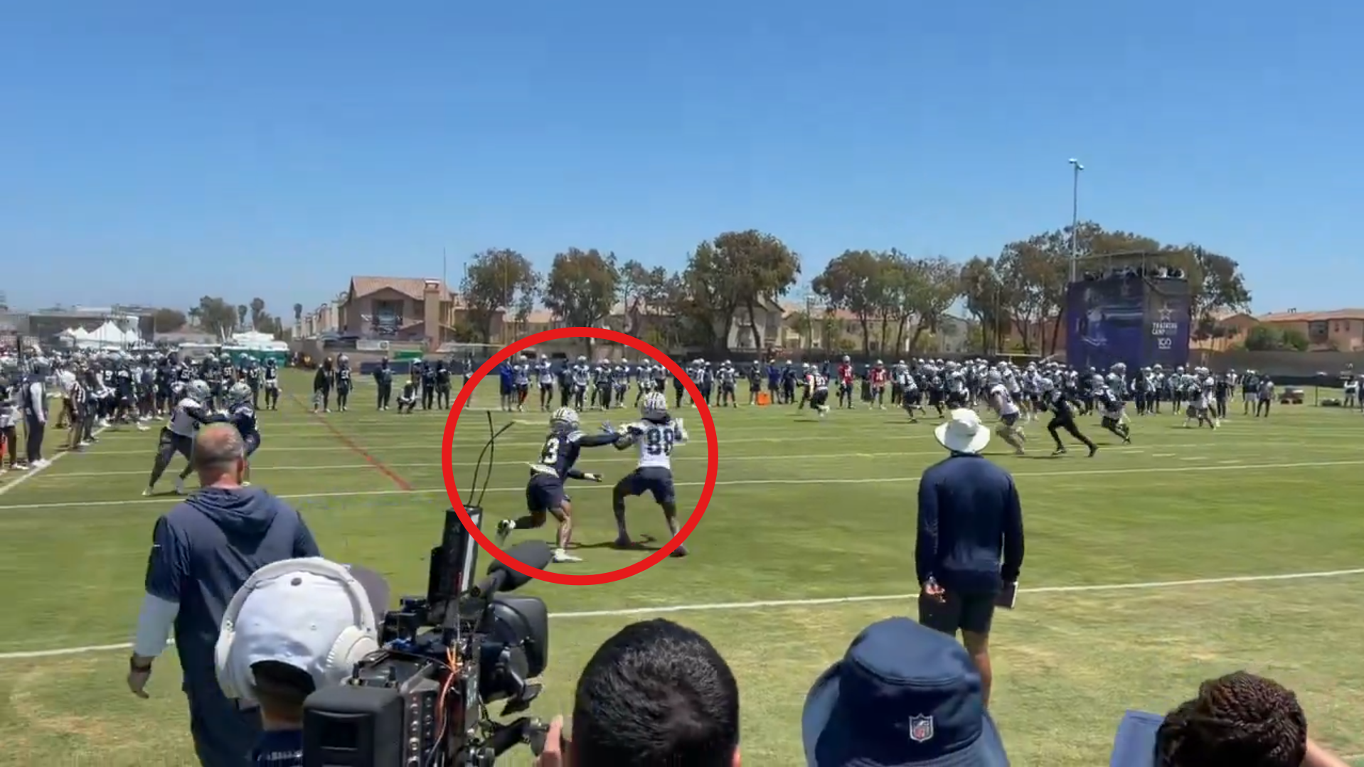 Dallas Cowboys safety/nickel Caleb Downs defends CeeDee Lamb in the end zone during training camp practice in Oxnard, California.