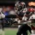 Dec 10, 2023; Atlanta, Georgia, USA; Atlanta Falcons cornerback Clark Phillips III (34) deflects a pass away from Tampa Bay Buccaneers wide receiver Chris Godwin (14) during the first half at Mercedes-Benz Stadium.