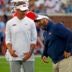 Sep 21, 2024; Oxford, Mississippi, USA; Mississippi Rebels head coach Lane Kiffin (left) shares a laugh with defensive coordinator Pete Golding (right) during warm ups prior to the game against the Georgia Southern Eagles at Vaught-Hemingway Stadium.
