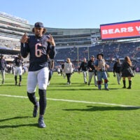 Oct 6, 2024; Chicago, Illinois, USA; Chicago Bears cornerback Kyler Gordon (6) celebrates after the game against the Carolina Panthers at Soldier Field.