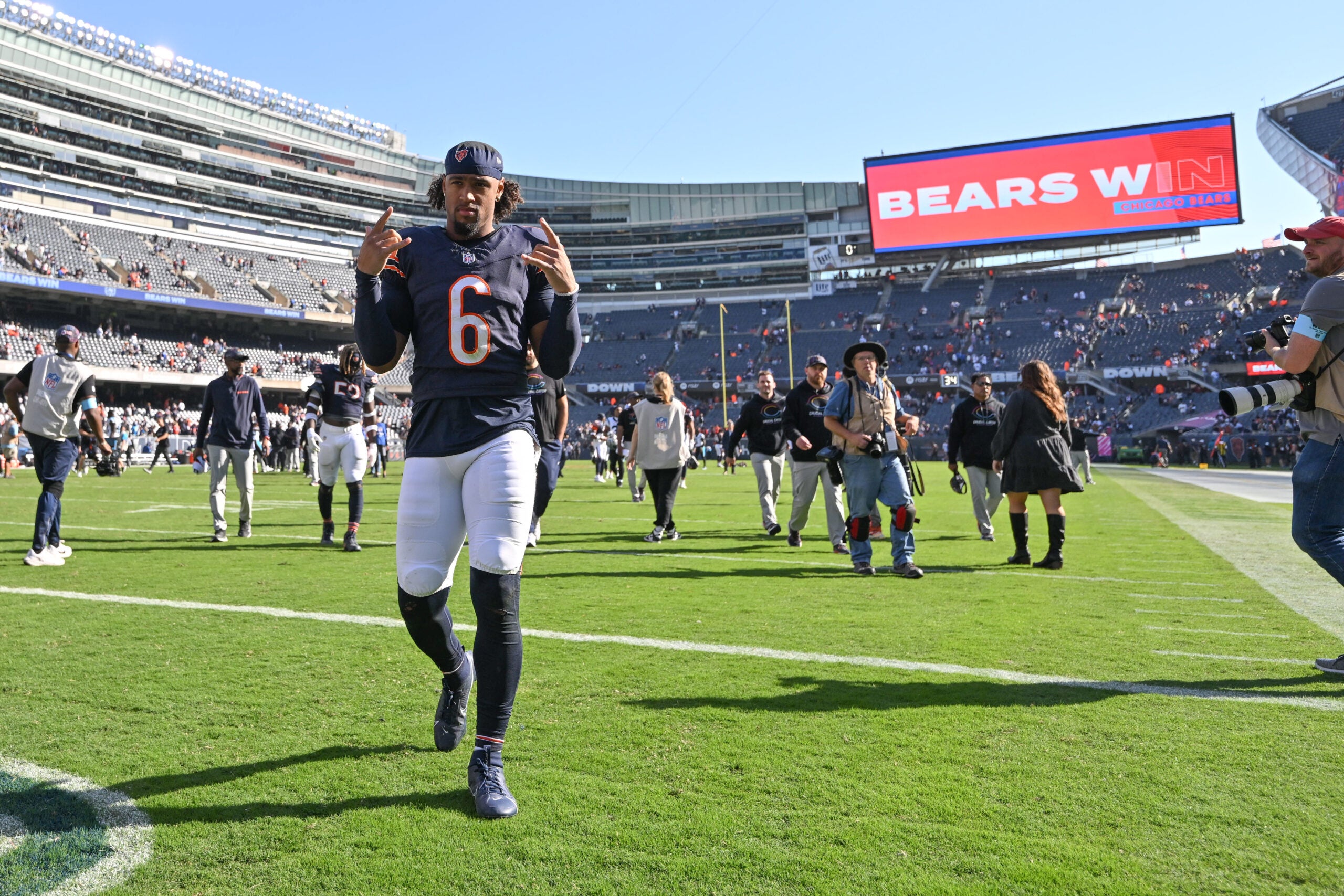 Oct 6, 2024; Chicago, Illinois, USA; Chicago Bears cornerback Kyler Gordon (6) celebrates after the game against the Carolina Panthers at Soldier Field.