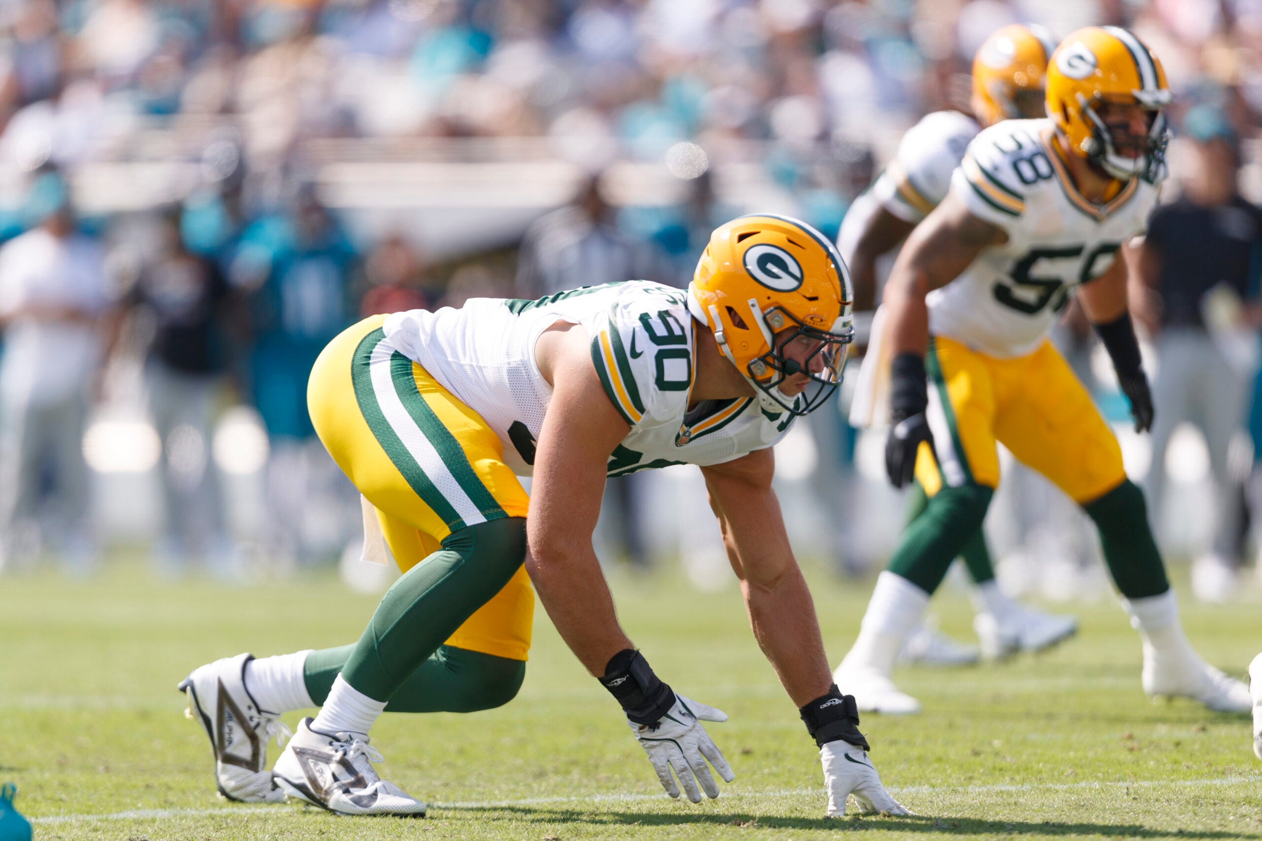 Oct 27, 2024; Jacksonville, Florida, USA; Green Bay Packers defensive lineman Lukas Van Ness (90) waits for the snap against the Jacksonville Jaguars during the second quarter at EverBank Stadium.