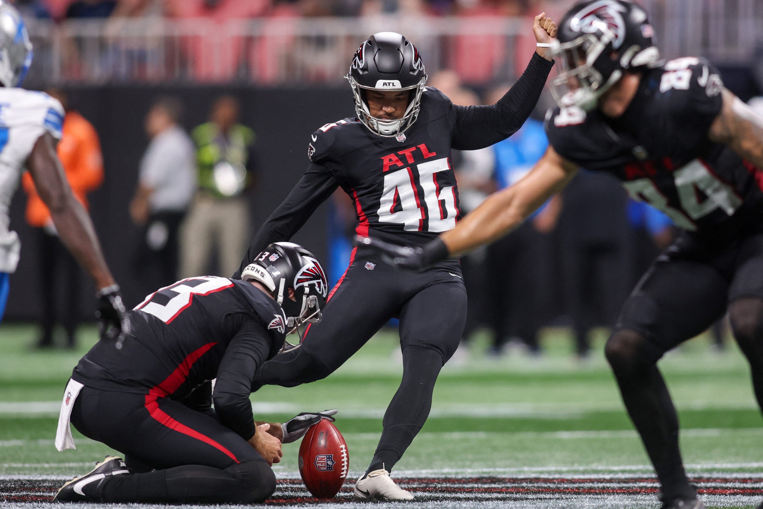 Aug 8, 2025; Atlanta, Georgia, USA; Atlanta Falcons place kicker Lenny Krieg (46) kicks a field goal against the Detroit Lions in the first quarter at Mercedes-Benz Stadium.