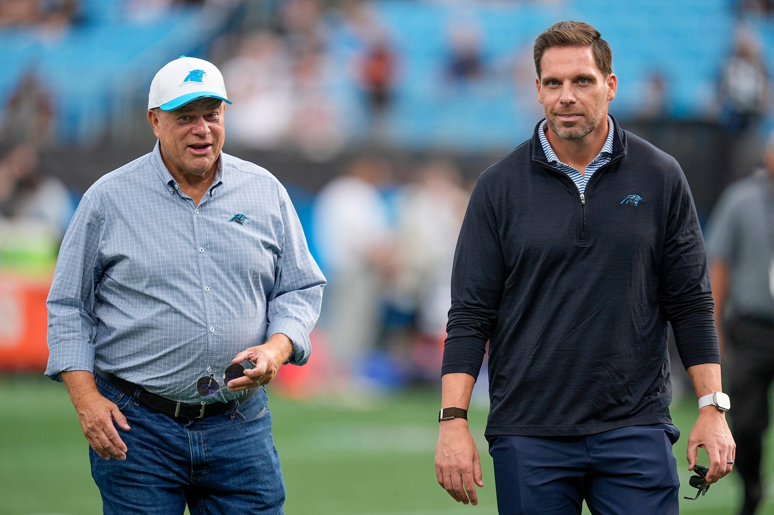 Aug 8, 2025; Charlotte, North Carolina, USA; Carolina Panthers team owner David Tepper and General Manager Dan Morgan during the first quarter between the Carolina Panthers and the Cleveland Browns at Bank of America Stadium.