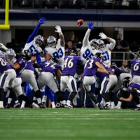 Aug 16, 2025; Arlington, Texas, USA; Baltimore Ravens place kicker Tyler Loop (33) kicks a field goal during the game between the Dallas Cowboys and the Baltimore Ravens at AT&T Stadium.