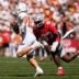 Ohio State Buckeyes defensive end Kenyatta Jackson Jr. (97) chases Texas Longhorns quarterback Arch Manning (16) during the NCAA football game at Ohio Stadium on Aug. 30, 2025.