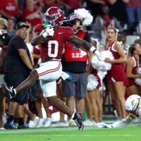 Sep 6, 2025; Tuscaloosa, Alabama, USA; Alabama Crimson Tide running back AK Dear (0) avoids a tackle by Louisiana Monroe Warhawks defensive back Carl Fauntroy (8) as he sprints to the endzone during the second half at Saban Field at Bryant-Denny Stadium.