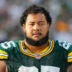 Sep 7, 2025; Green Bay, Wisconsin, USA; Green Bay Packers guard Aaron Banks (65) during the game against the Detroit Lions at Lambeau Field.