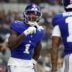 Sep 14, 2025; Arlington, Texas, USA; New York Giants wide receiver Malik Nabers (1) celebrates after scoring a touchdown against the Dallas Cowboys during the second quarter at AT&T Stadium.