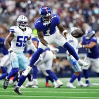 Sep 14, 2025; Arlington, Texas, USA; New York Giants wide receiver Malik Nabers (1) is unable to make a catch against the Dallas Cowboys during the fourth quarter at AT&T Stadium.