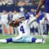 Sep 14, 2025; Arlington, Texas, USA; Dallas Cowboys quarterback Dak Prescott (4) reacts after a play against the New York Giants during overtime at AT&T Stadium.
