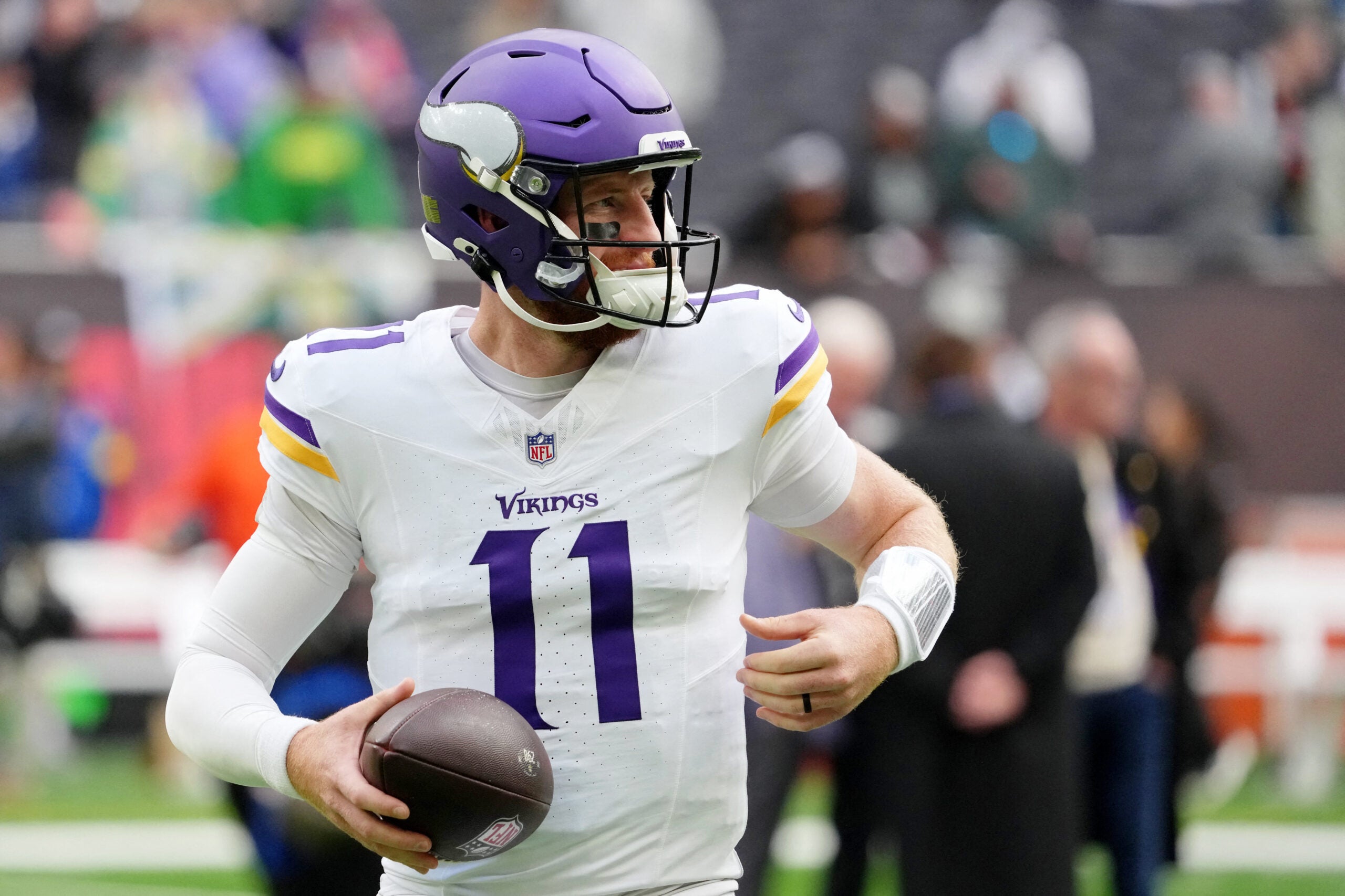 Oct 5, 2025; Tottenham, United Kingdom; Minnesota Vikings quarterback Carson Wentz (11) warms up before an NFL International Series game between the Minnesota Vikings and the Cleveland Browns at Tottenham Hotspur Stadium.