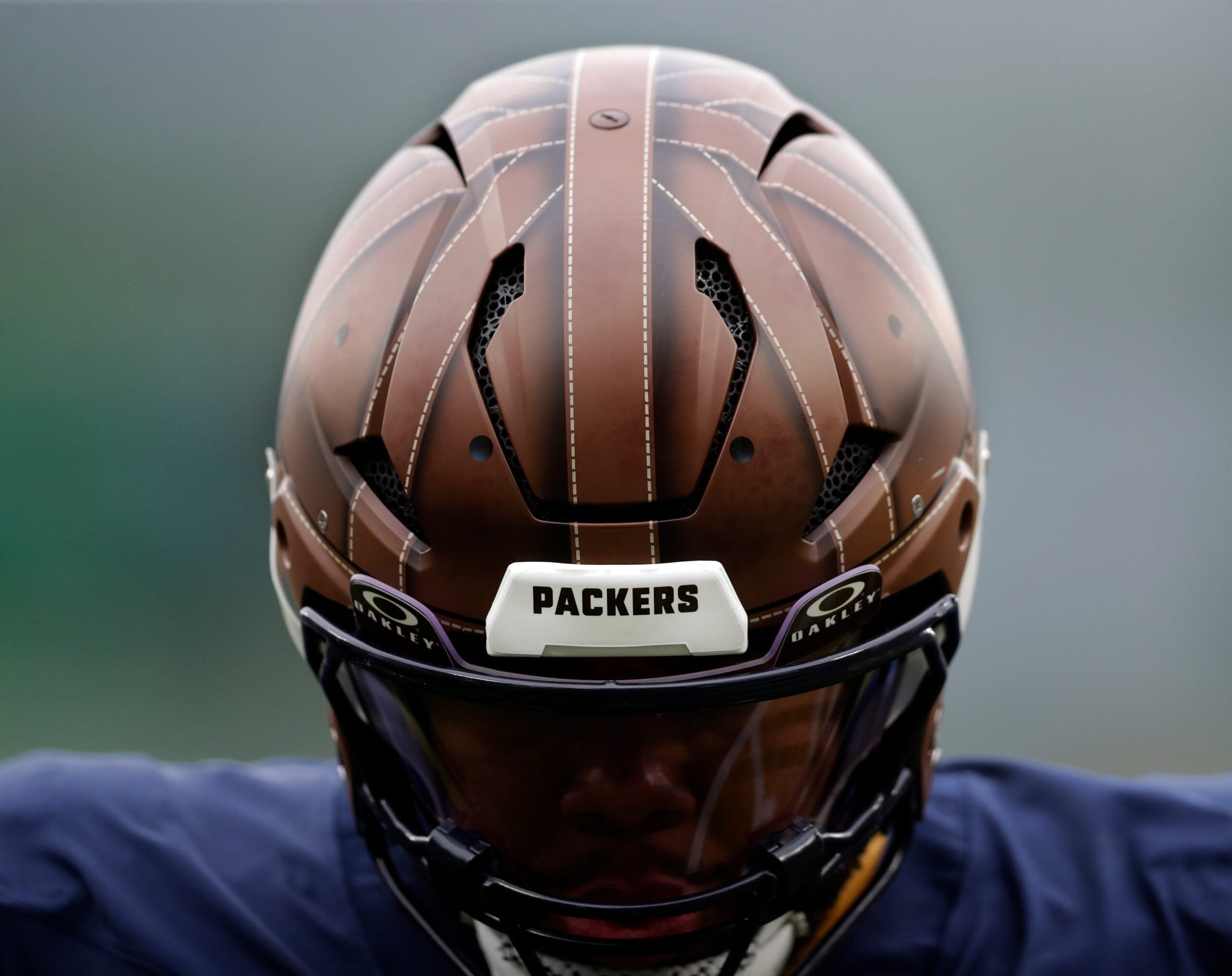 A close-up of a 1923 throwback helmet worn by Green Bay Packers running back Josh Jacobs before the game against the Carolina Panthers on Nov. 2, 2025, at Lambeau Field in Green Bay, Wis.